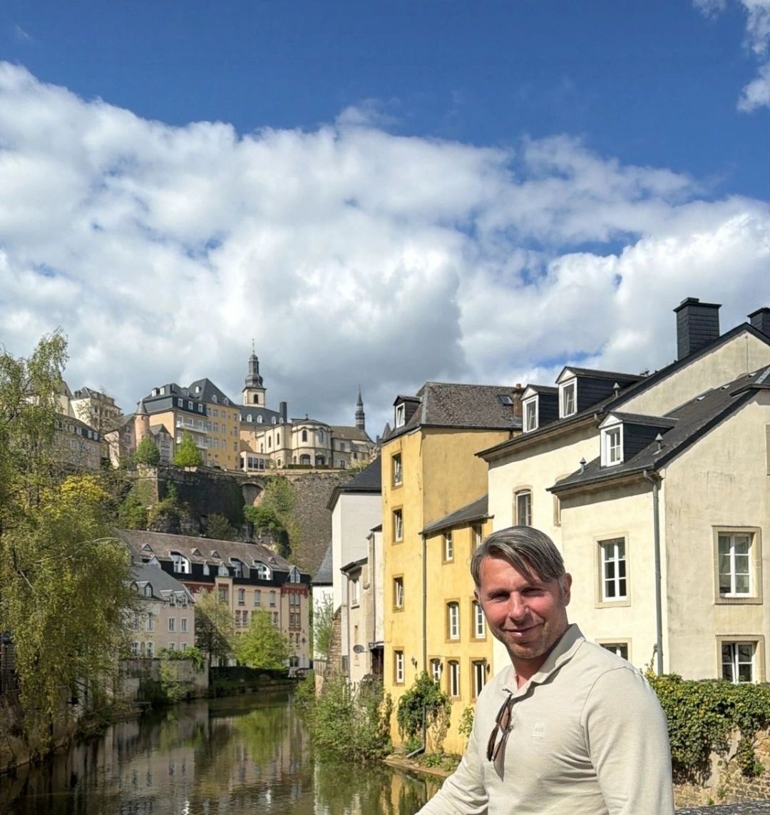 View across the Alzette river to the old town skyline of Luxembourg City at midday